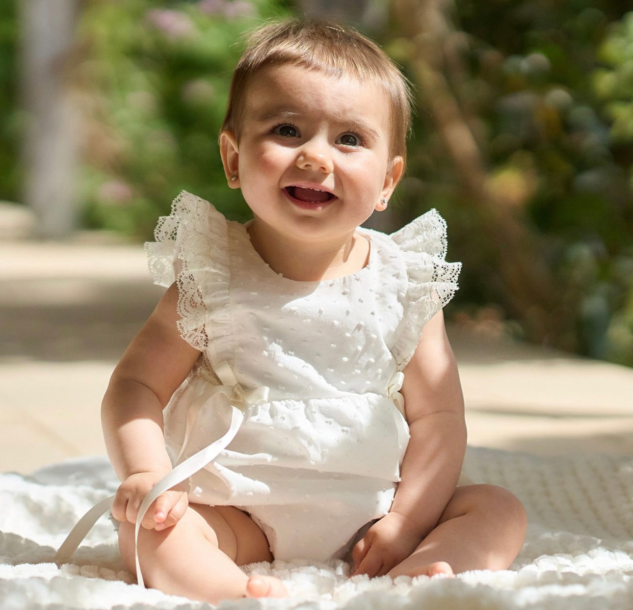 Rapife ivory frilled bow romper