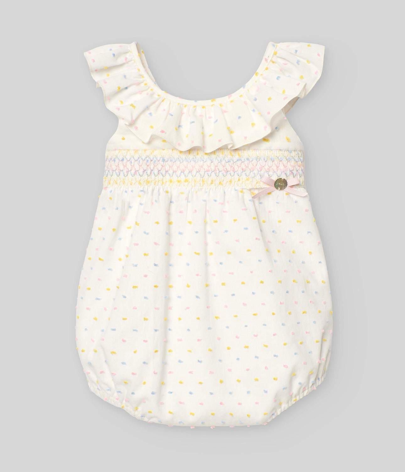 Paz Rodriguez pink, blue, and yellow dotted smocked romper