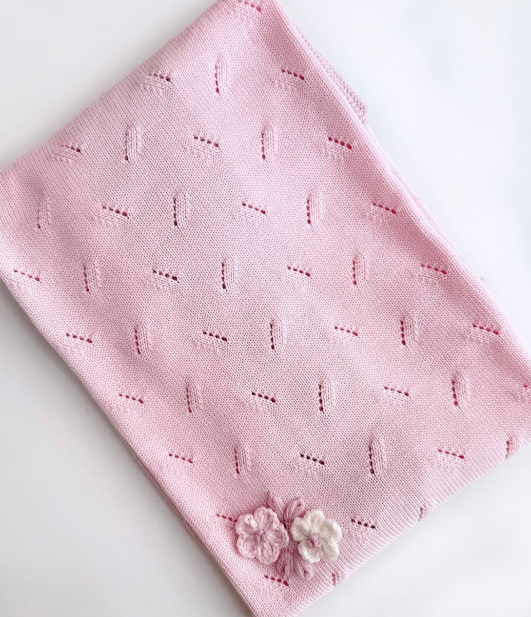 Bimbalo pink knit flower blanket