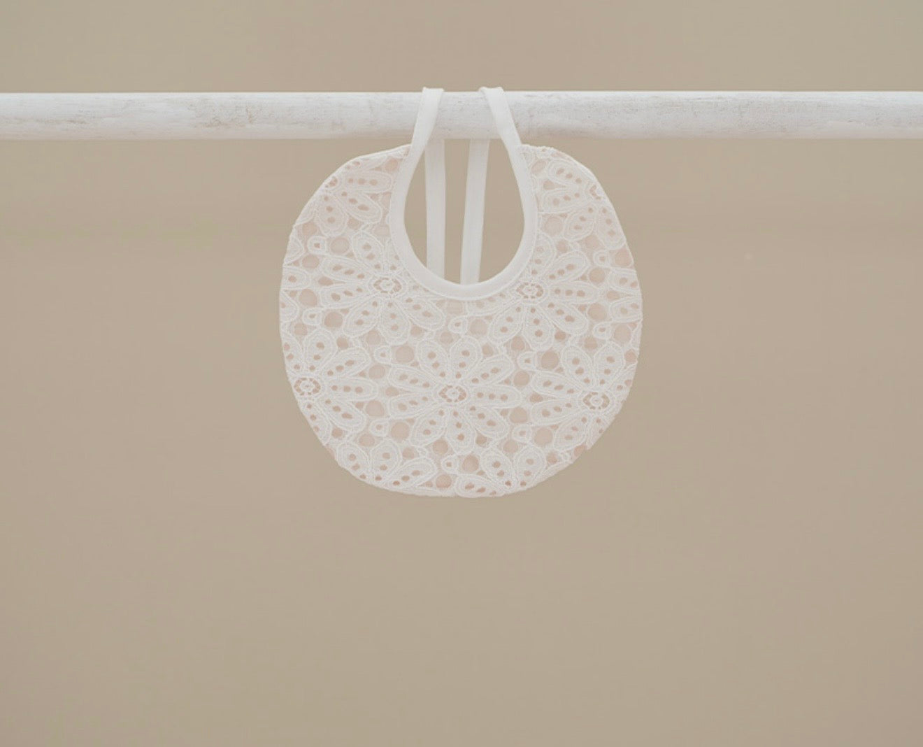 Ninnoah peach lace bib