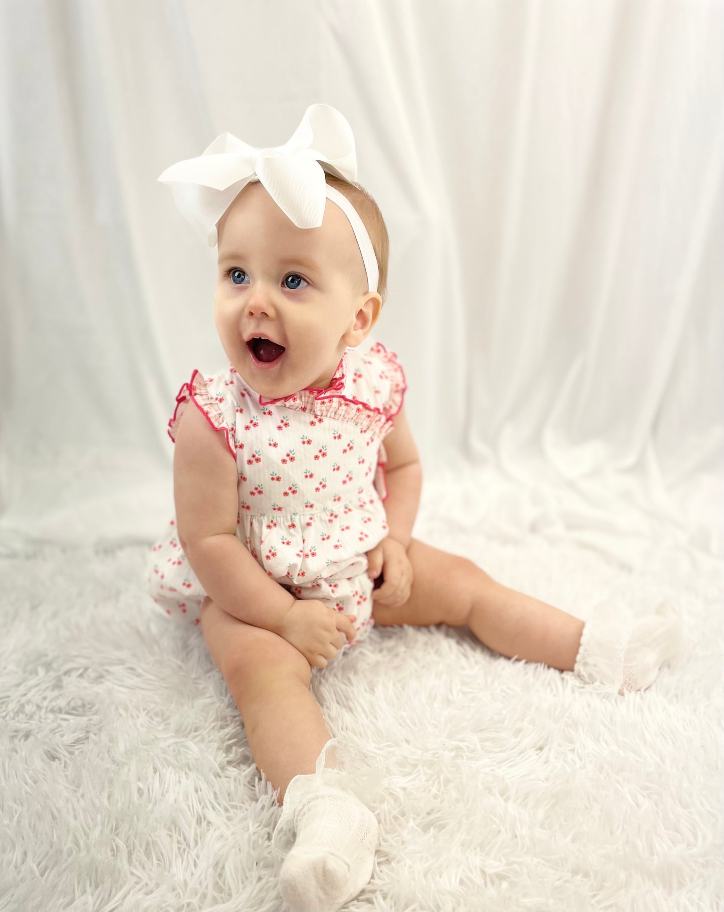 Deolinda coral floral bow romper