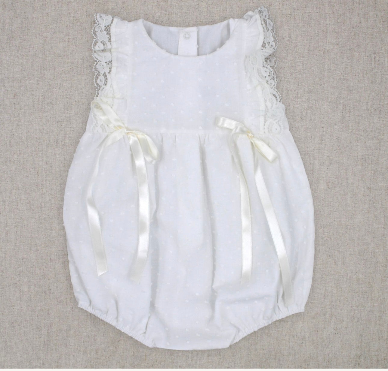 Rapife ivory frilled bow romper
