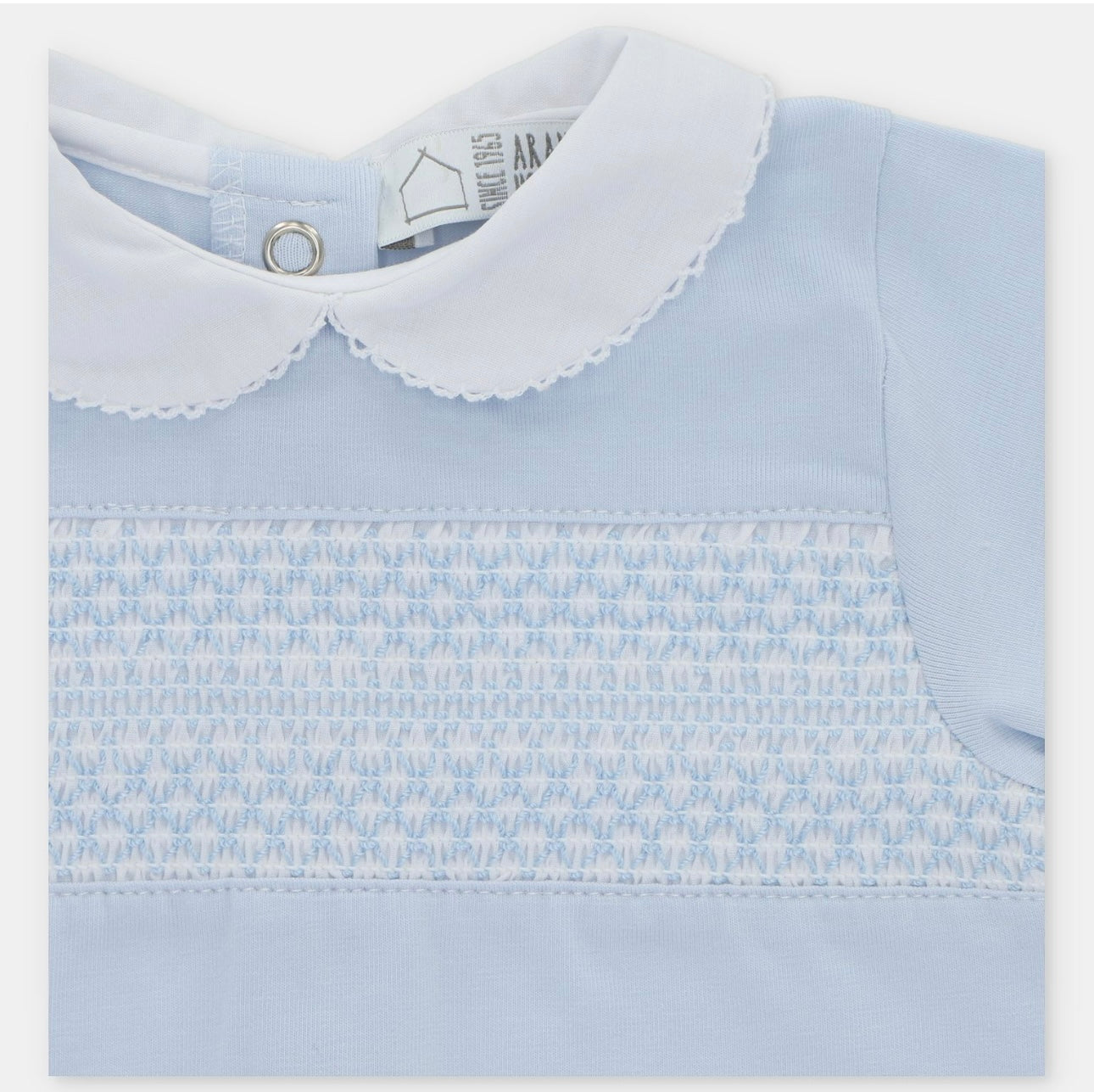 Martin Aranda blue smocked babygrow