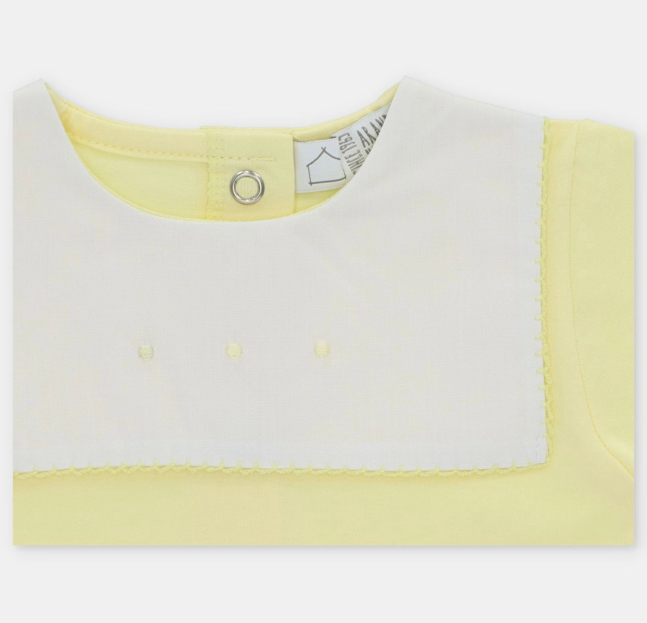 Martin Aranda yellow bibbed babygrow