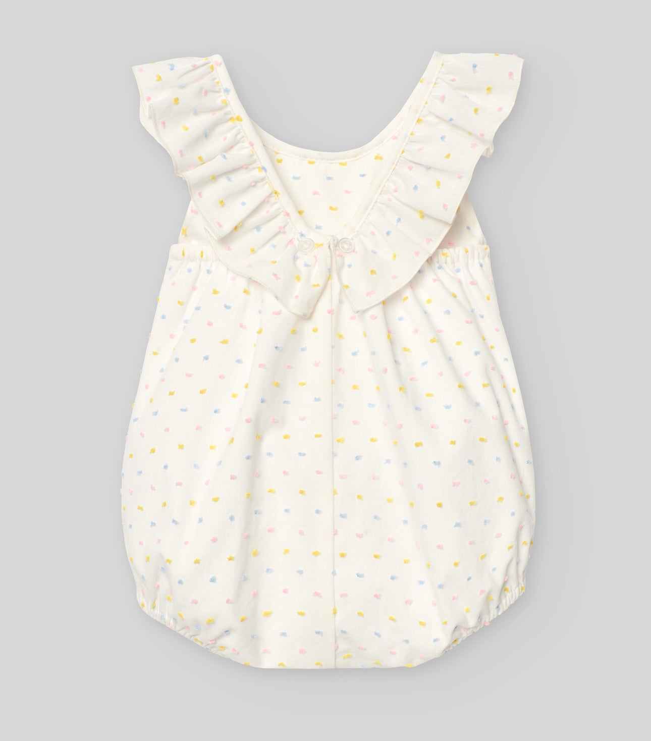 Paz Rodriguez pink, blue, and yellow dotted smocked romper