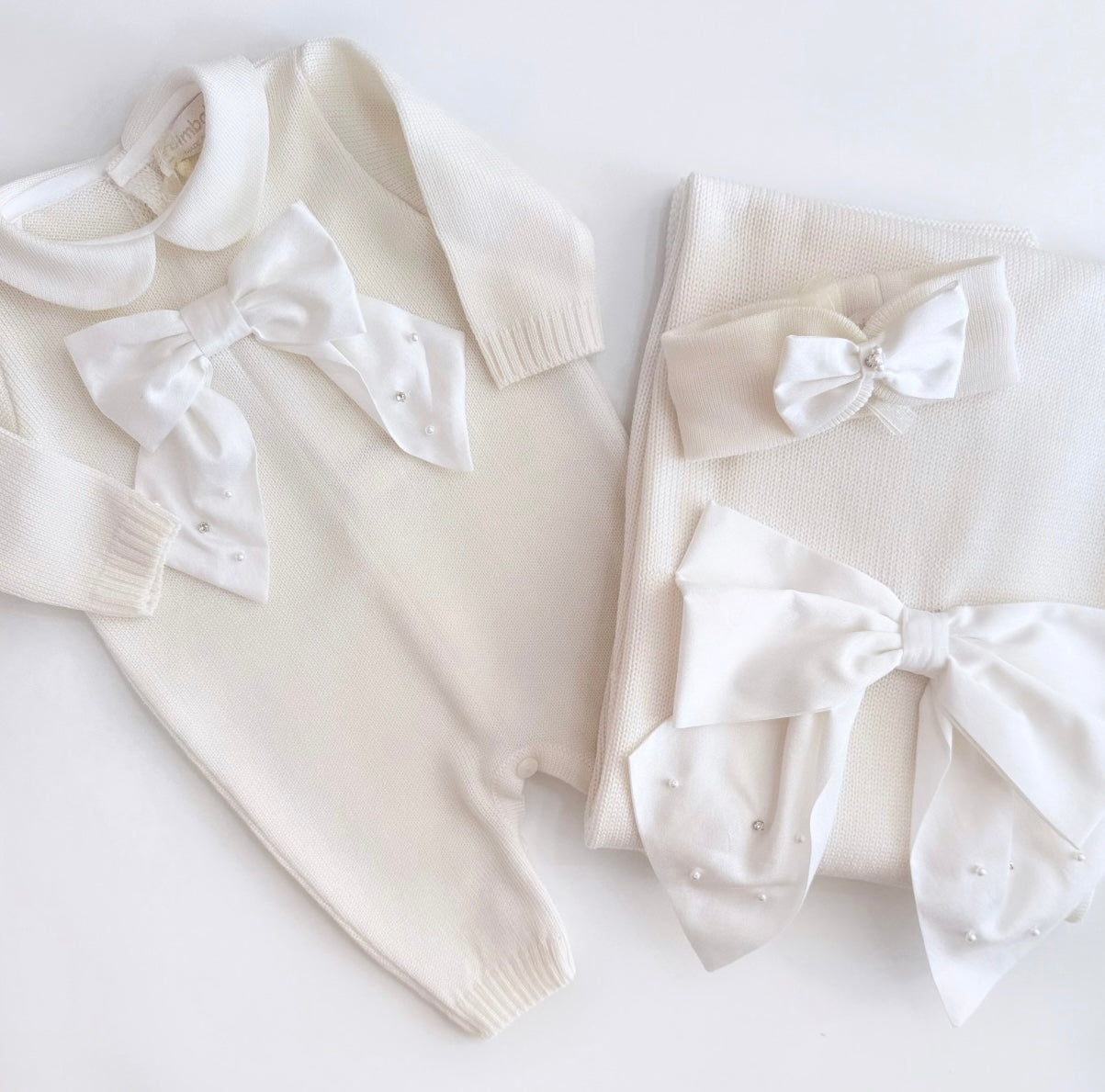 Bimbalo cream knit bow babygrow
