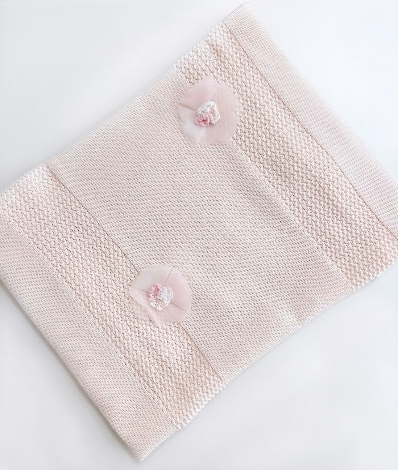 Bimbalo pink knit flower appliqué blanket