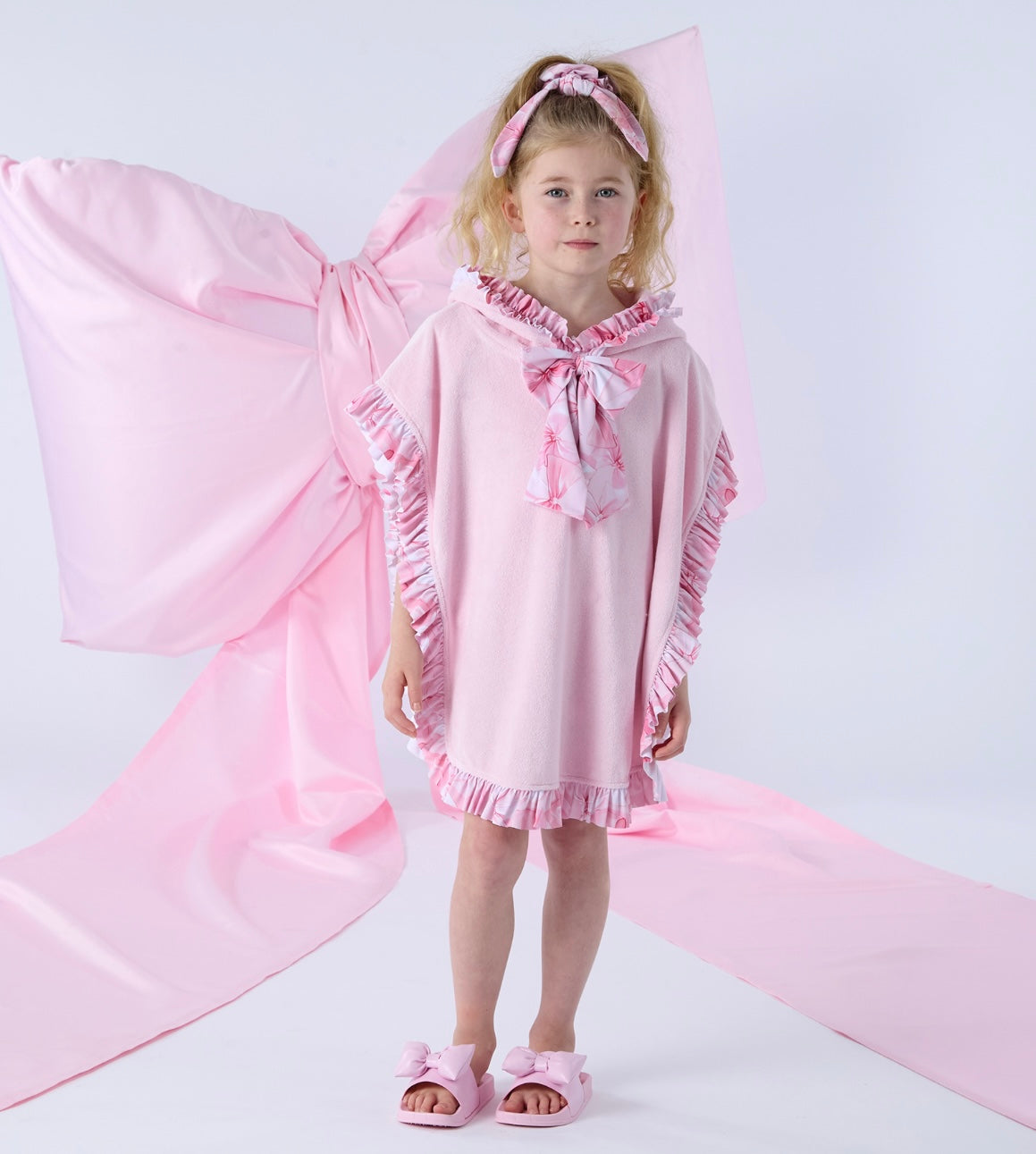 Adee ‘Rosie’ bow print towelling poncho
