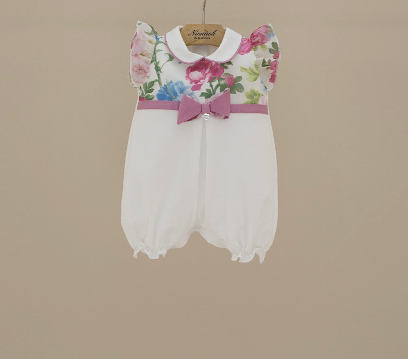 Ninnoah pink & blue roses romper