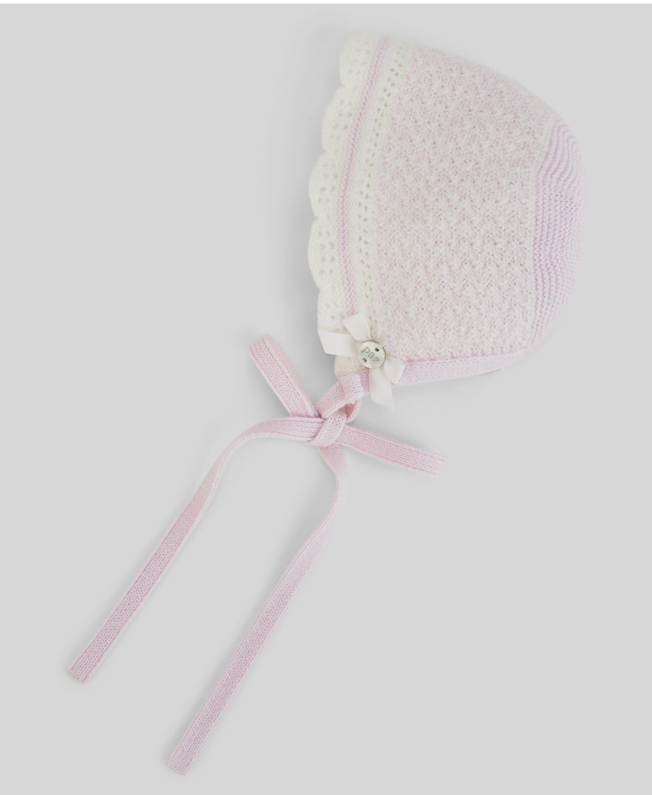 Paz Rodriguez pale pink lace knitted bonnet