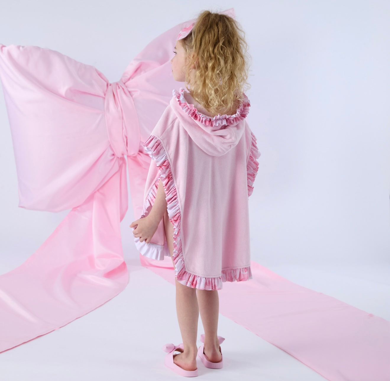 Adee ‘Rosie’ bow print towelling poncho